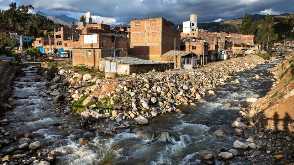 Two glacial streams flow together in Huaraz